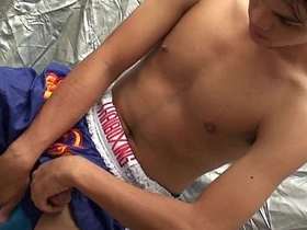 Gay Asian twink Joss masturbates