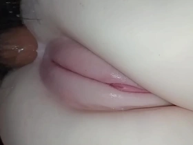 The pleasure of anal play with oily teen on her favorite doll toy